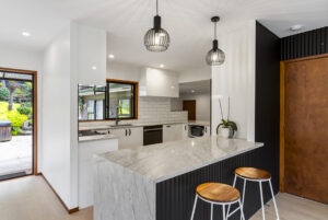 Completed Mairangi Bay home and kitchen renovation by Macalister Construction, featuring updated living spaces and quality interior finishes.