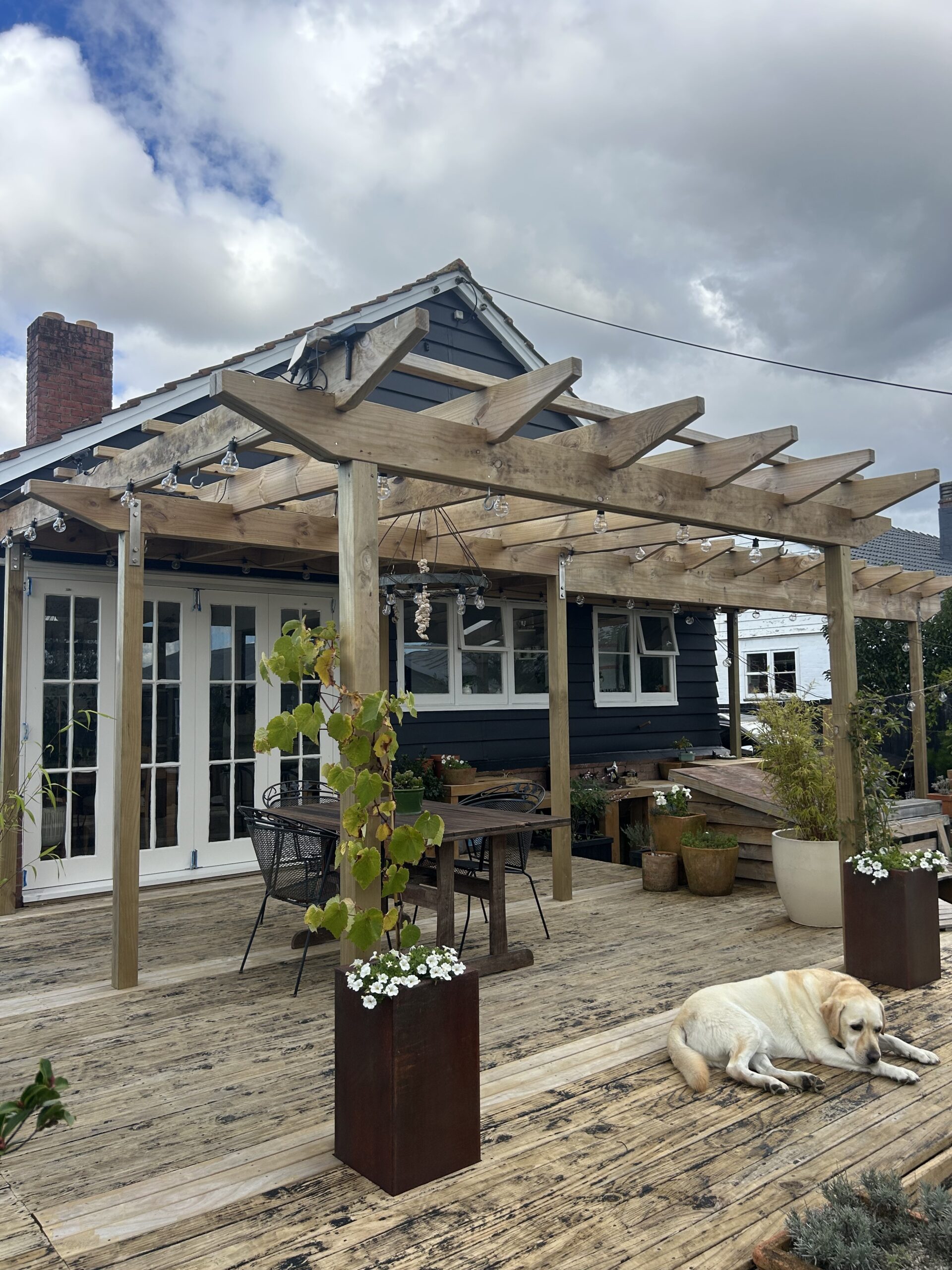 For the first image, I’d target the pergola/outdoor-living side of your SEO. For the second, I’d target the combination of Garapa decking, balustrade and deck enclosure/detailing. Image 1 – Timber Pergola Covering Title: Custom timber pergola covering an outdoor entertaining area and timber deck built by Macalister Construction in Auckland.
